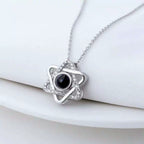 hexagram projection necklace、six-pointed star pendant、custom photo projection jewelry、celestial star necklace、personalized memory keepsake、romantic couple gift
